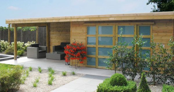 Abri de jardin Modern avec système alpha en bois et de style moderne chez Brin de Jardins à Esvres